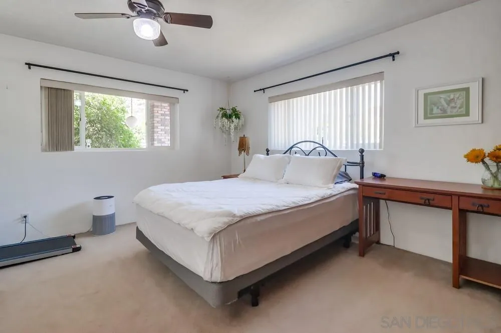 12718 Willow Road Lakeside, CA 92040 - Photo 13 of 46 a bedroom with a bed and window