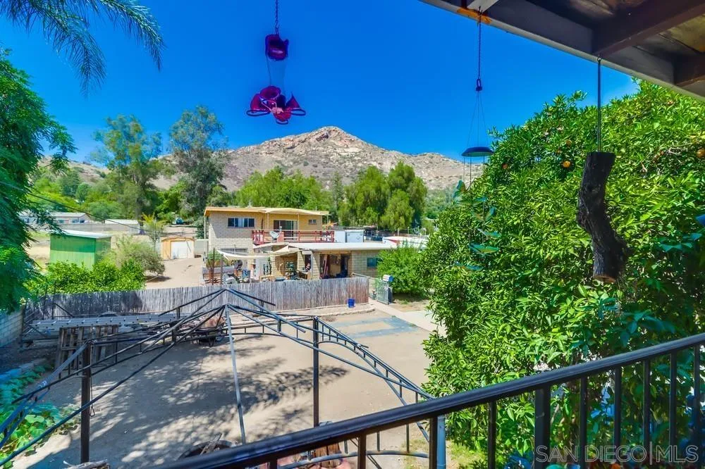 12718 Willow Road Lakeside, CA 92040 - Photo 19 of 46 a view of a backyard with sitting area