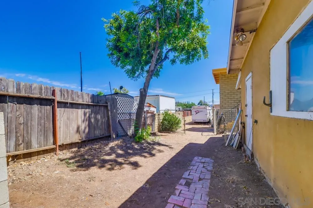12718 Willow Road Lakeside, CA 92040 - Photo 24 of 46 a view of a backyard with potted plants
