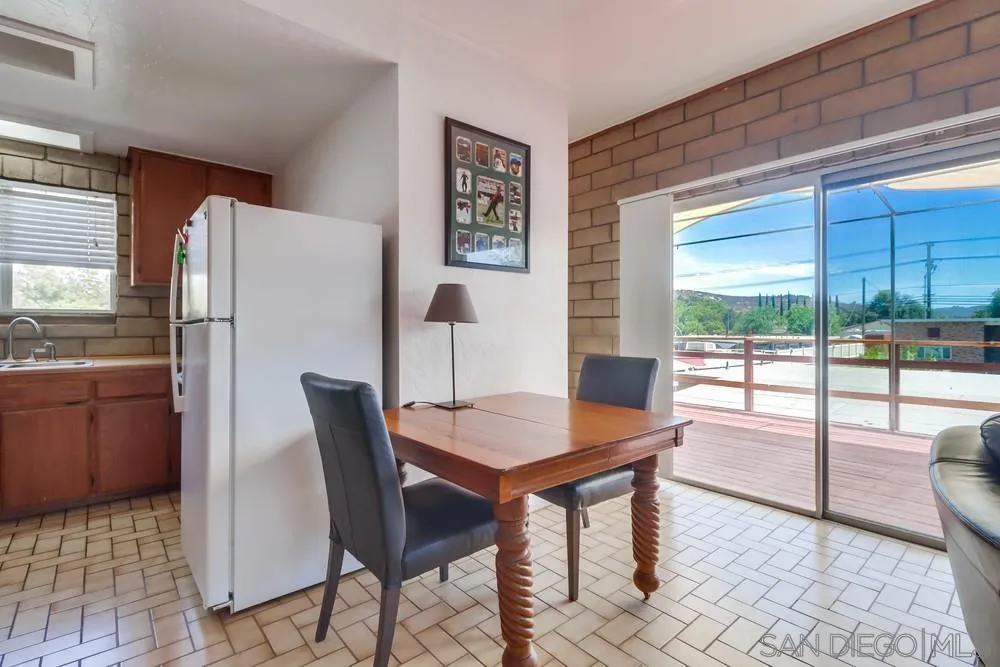 12718 Willow Road Lakeside, CA 92040 - Photo 27 of 46 a view of a dining room with furniture window and outside view