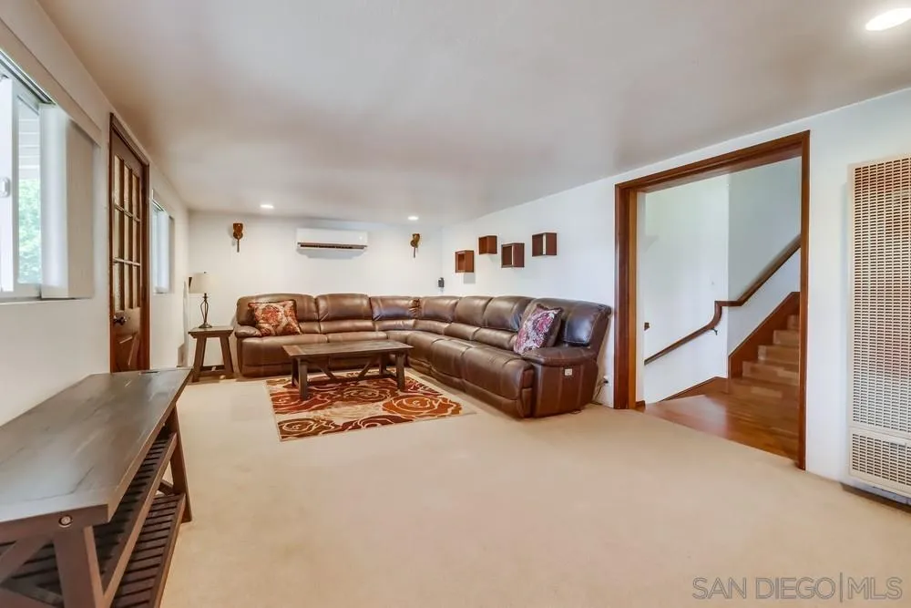 12718 Willow Road Lakeside, CA 92040 - Photo 3 of 46 a living room with furniture and a wooden floor