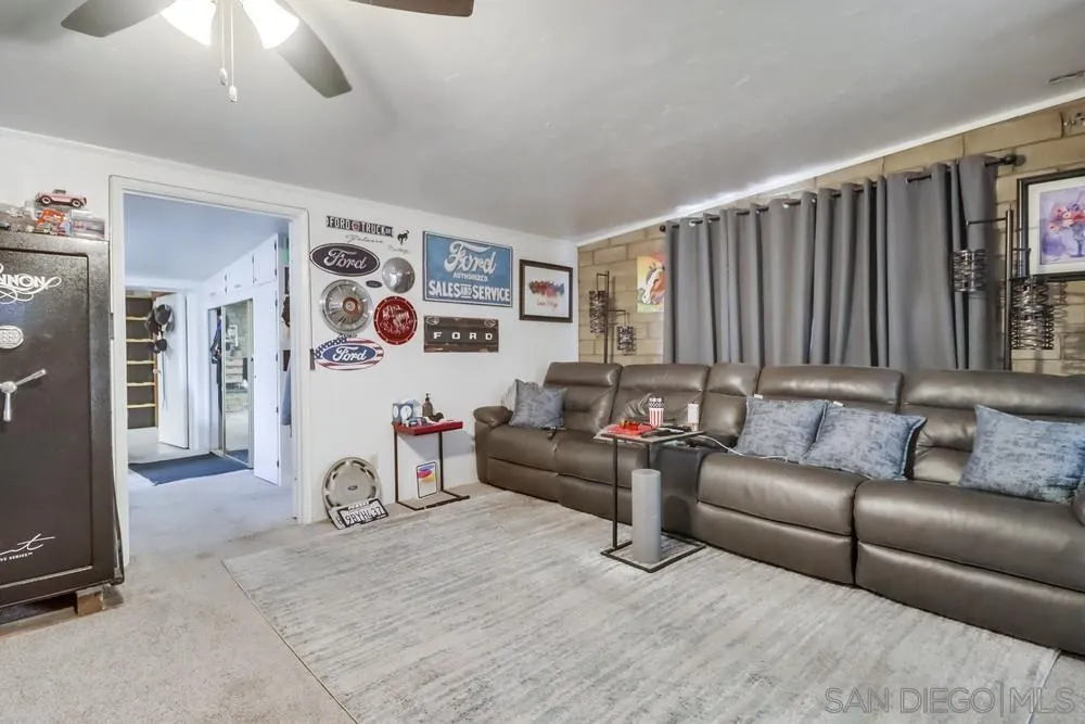 12718 Willow Road Lakeside, CA 92040 - Photo 36 of 46 a living room with furniture and a couch