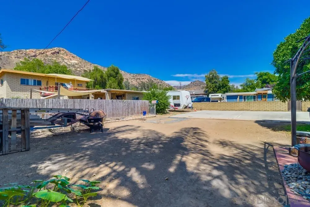 12718 Willow Road Lakeside, CA 92040 - Photo 38 of 46 a view of a street with a car parked in front of it