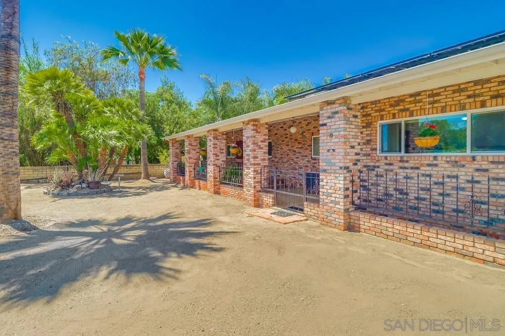 12718 Willow Road Lakeside, CA 92040 - Photo 46 of 46 a view of house with backyard and tree