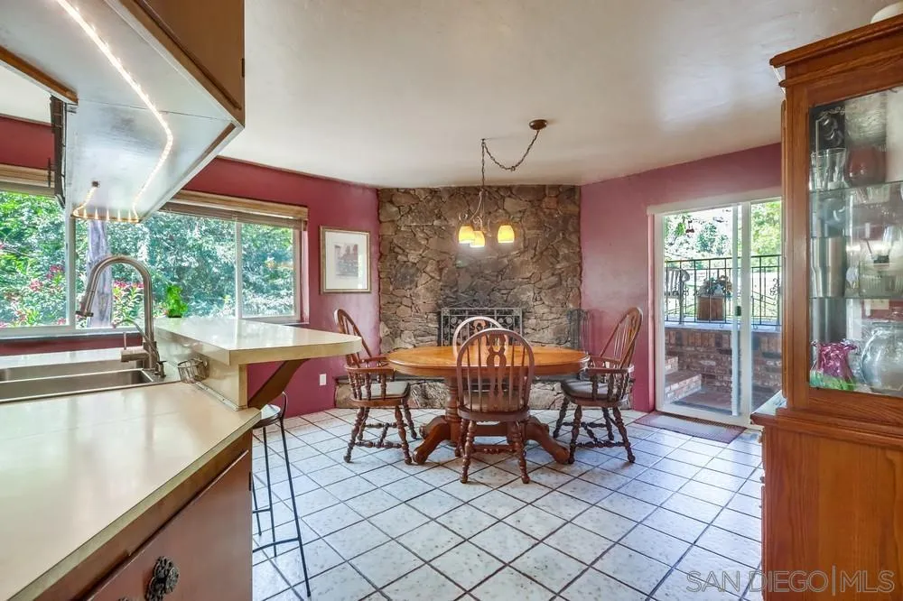 12718 Willow Road Lakeside, CA 92040 - Photo 10 of 46 a view of a dining room with furniture window and outside view