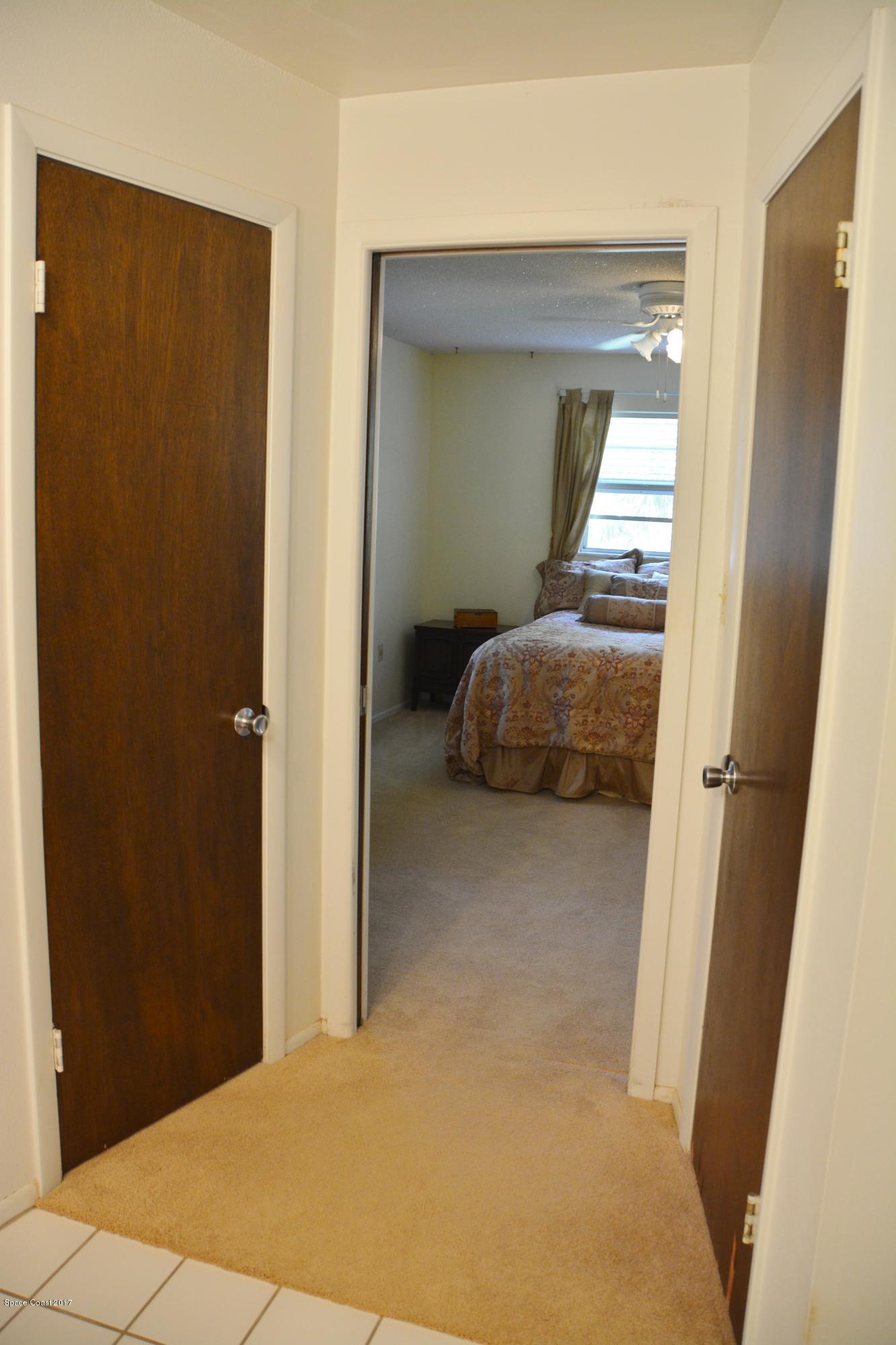 1615 Harlock Road Melbourne, FL 32934 - Photo 25 of 50 Master - His & Her Closets