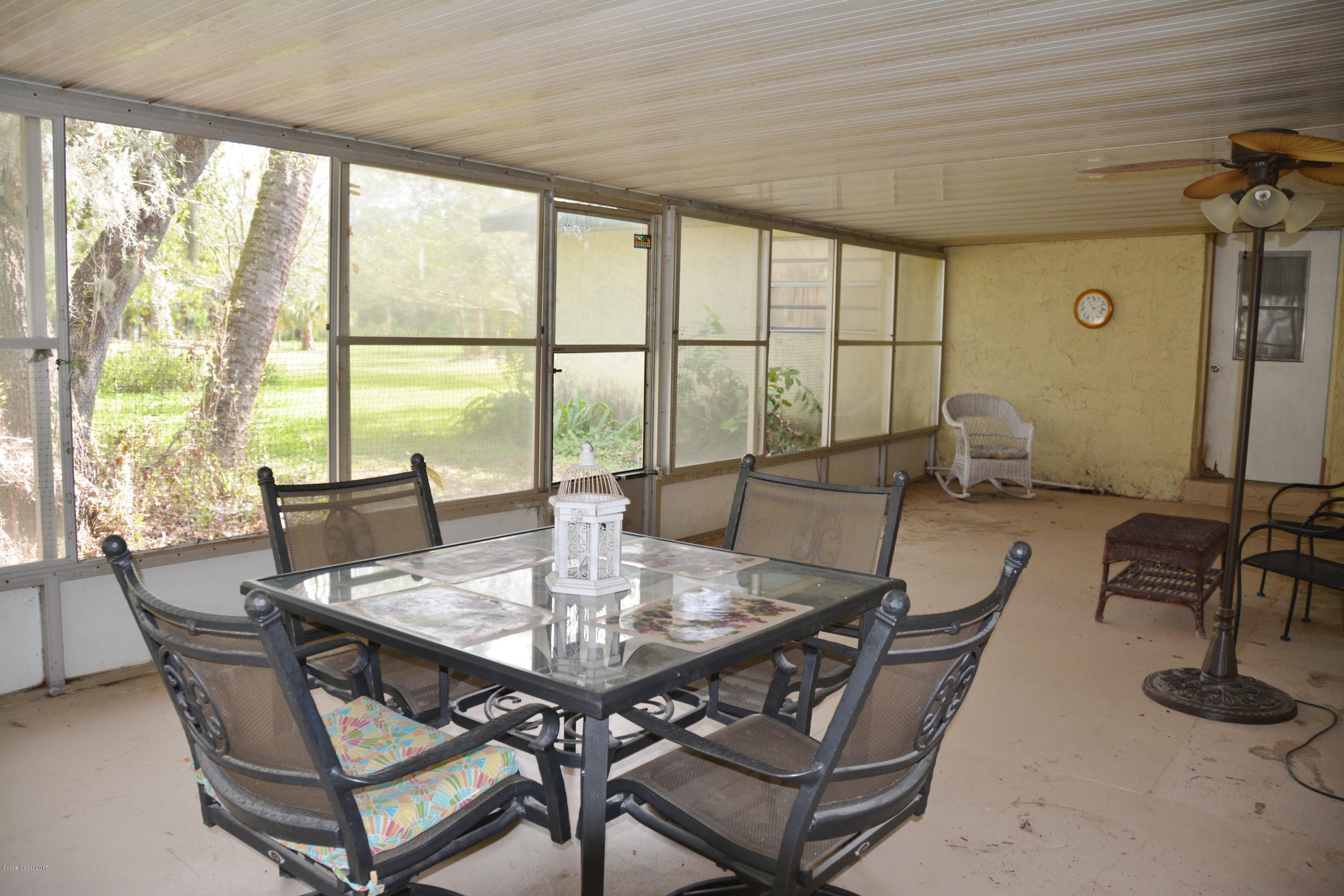 1615 Harlock Road Melbourne, FL 32934 - Photo 30 of 50 Screened porch 2