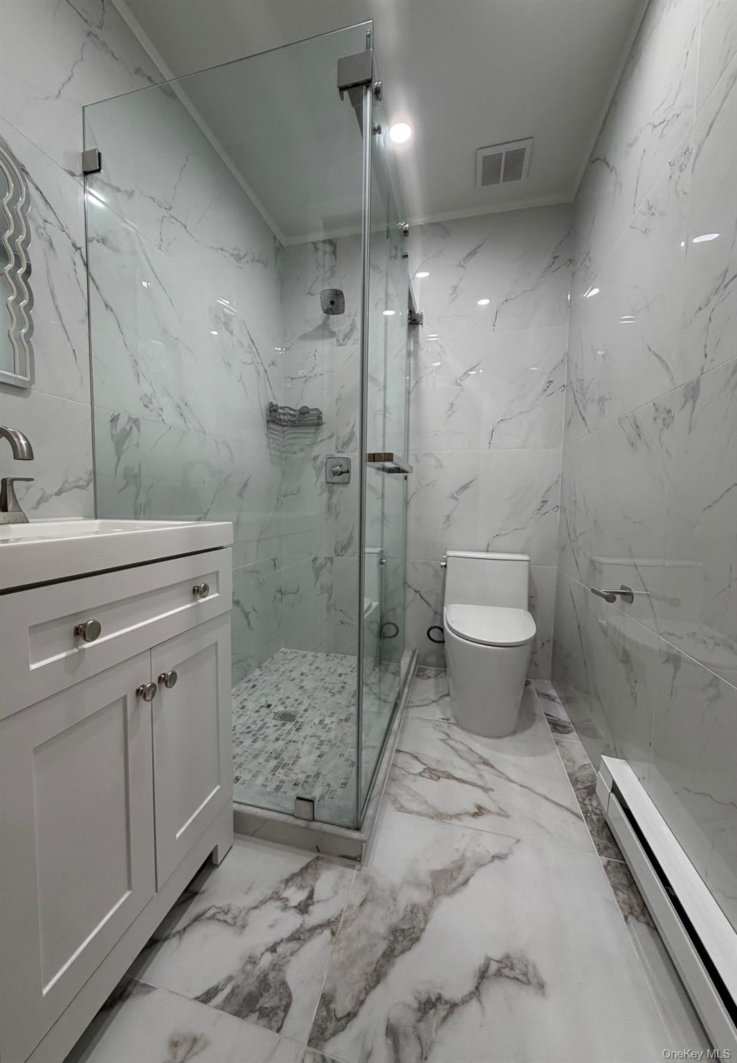 60 Medallion Road Kiamesha Lake, NY 12751 - Photo 23 of 44 a bathroom with a shower toilet and sink