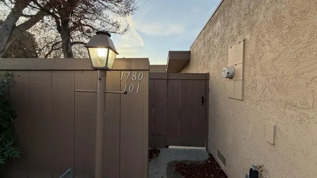 a bathroom with a shower and toilet