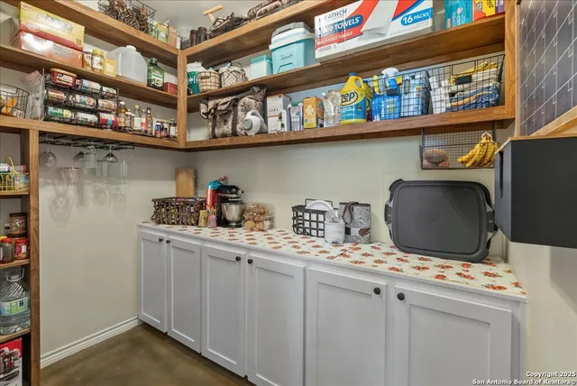 a room with storage and utility