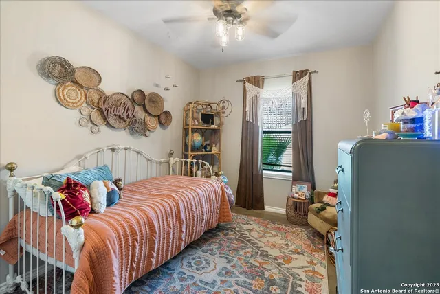 a bedroom with a bed and furniture