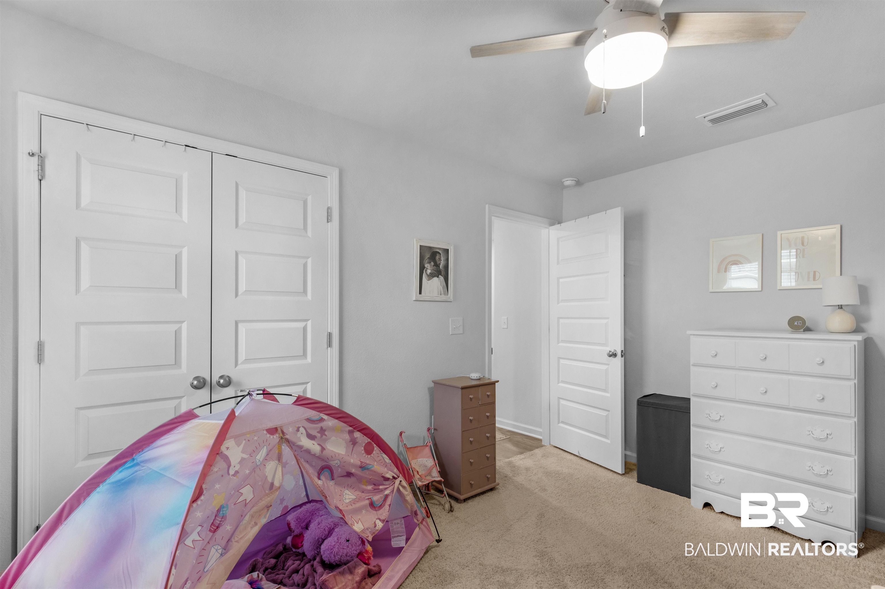10313 Ruffian Route Daphne, AL 36526 - Photo 9 of 46 Carpeted bedroom with ceiling fan and a closet