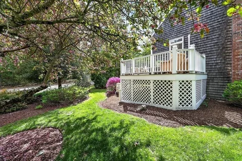 a garden view with a deck