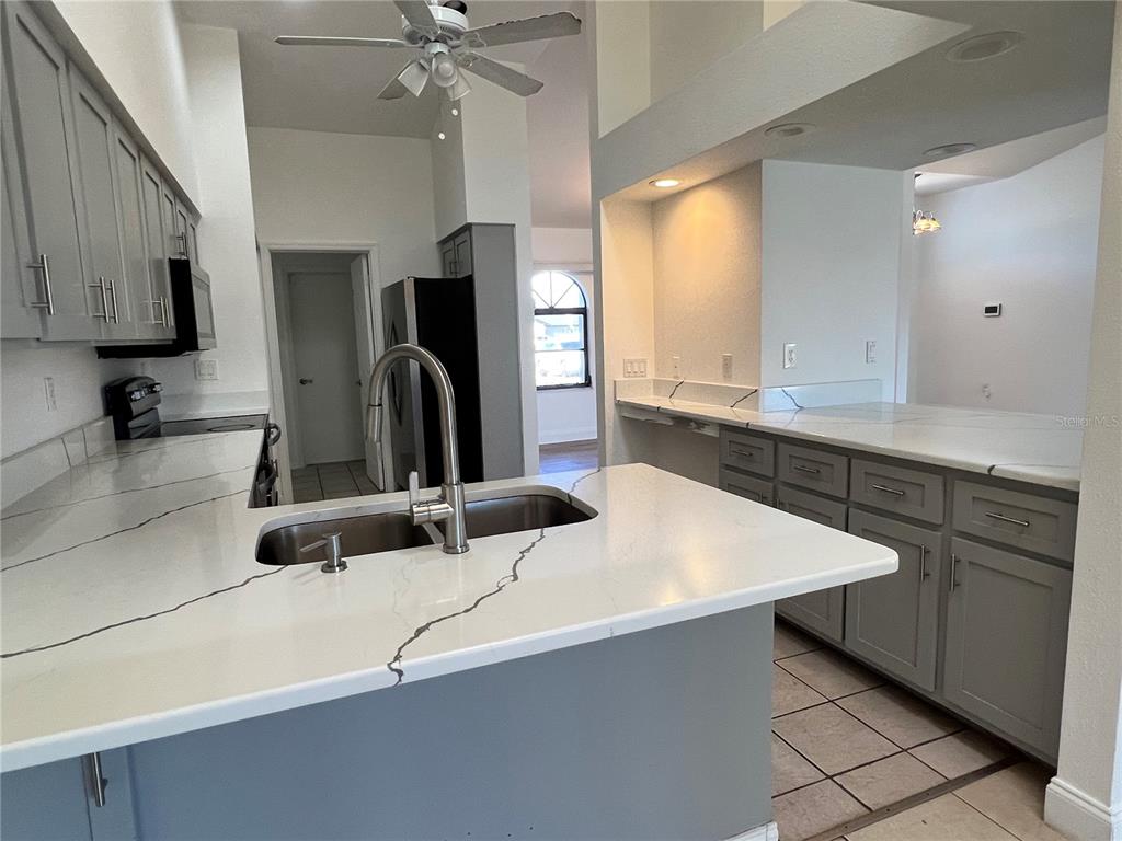 2092 Rio De Janeiro Avenue Punta Gorda, FL 33983 - Photo 12 of 50 a bathroom with a sink and a mirror