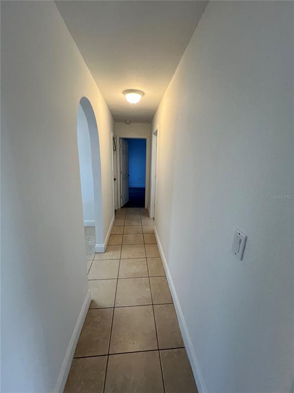 2092 Rio De Janeiro Avenue Punta Gorda, FL 33983 - Photo 29 of 50 a view of hallway with a window and a mirror