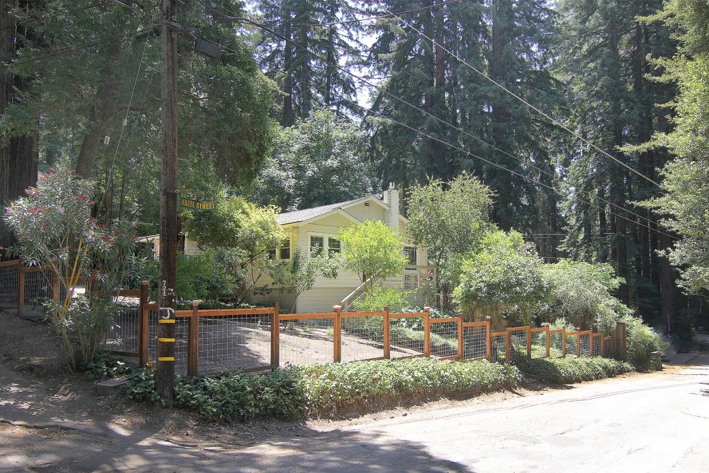 10990 Riverside Road Brookdale, CA 95005 - Photo 1 of 29 a view of a bench in a backyard
