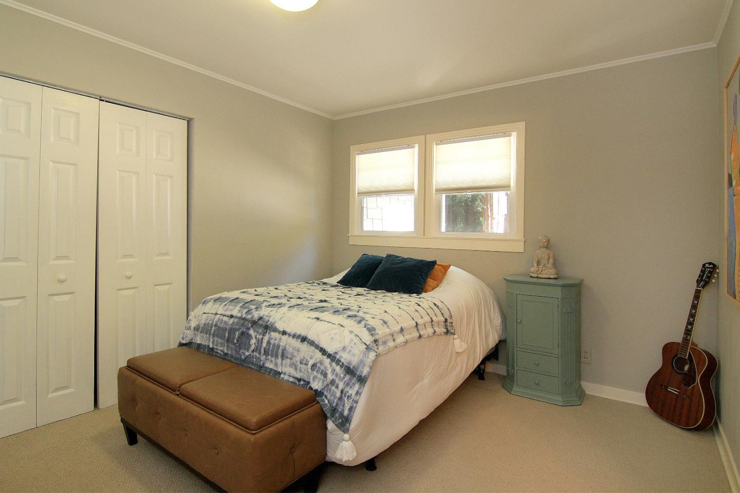 10990 Riverside Road Brookdale, CA 95005 - Photo 11 of 29 a bedroom with a bed and a window