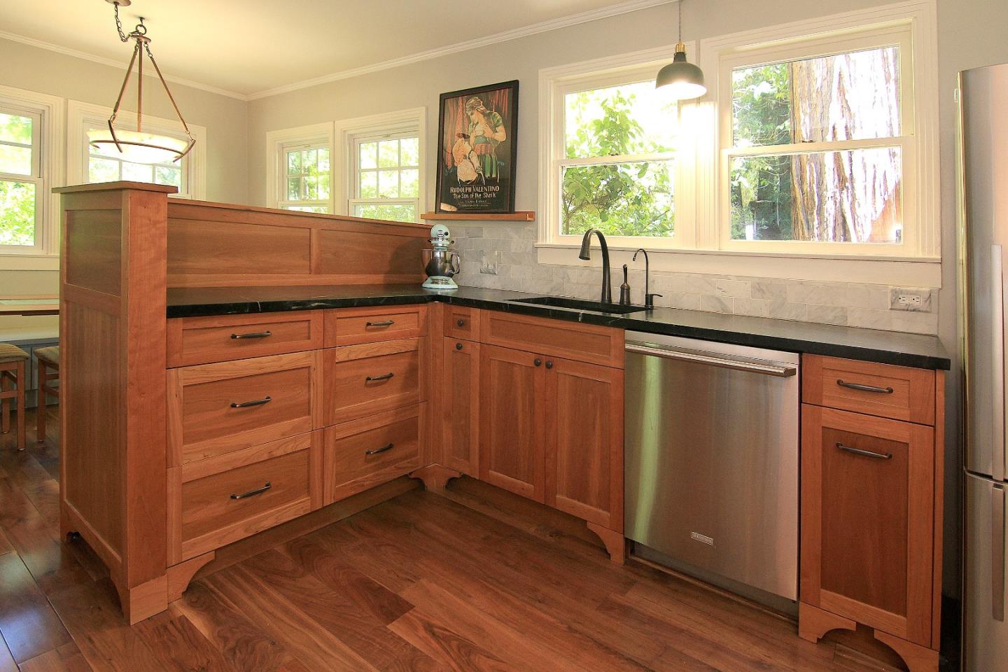 10990 Riverside Road Brookdale, CA 95005 - Photo 13 of 29 a kitchen with stainless steel appliances granite countertop a sink a window and wooden floors
