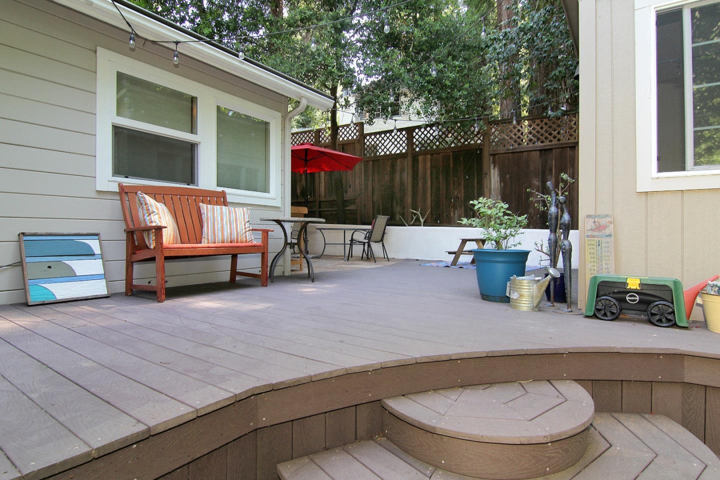 10990 Riverside Road Brookdale, CA 95005 - Photo 23 of 29 a backyard of a house with table and chairs