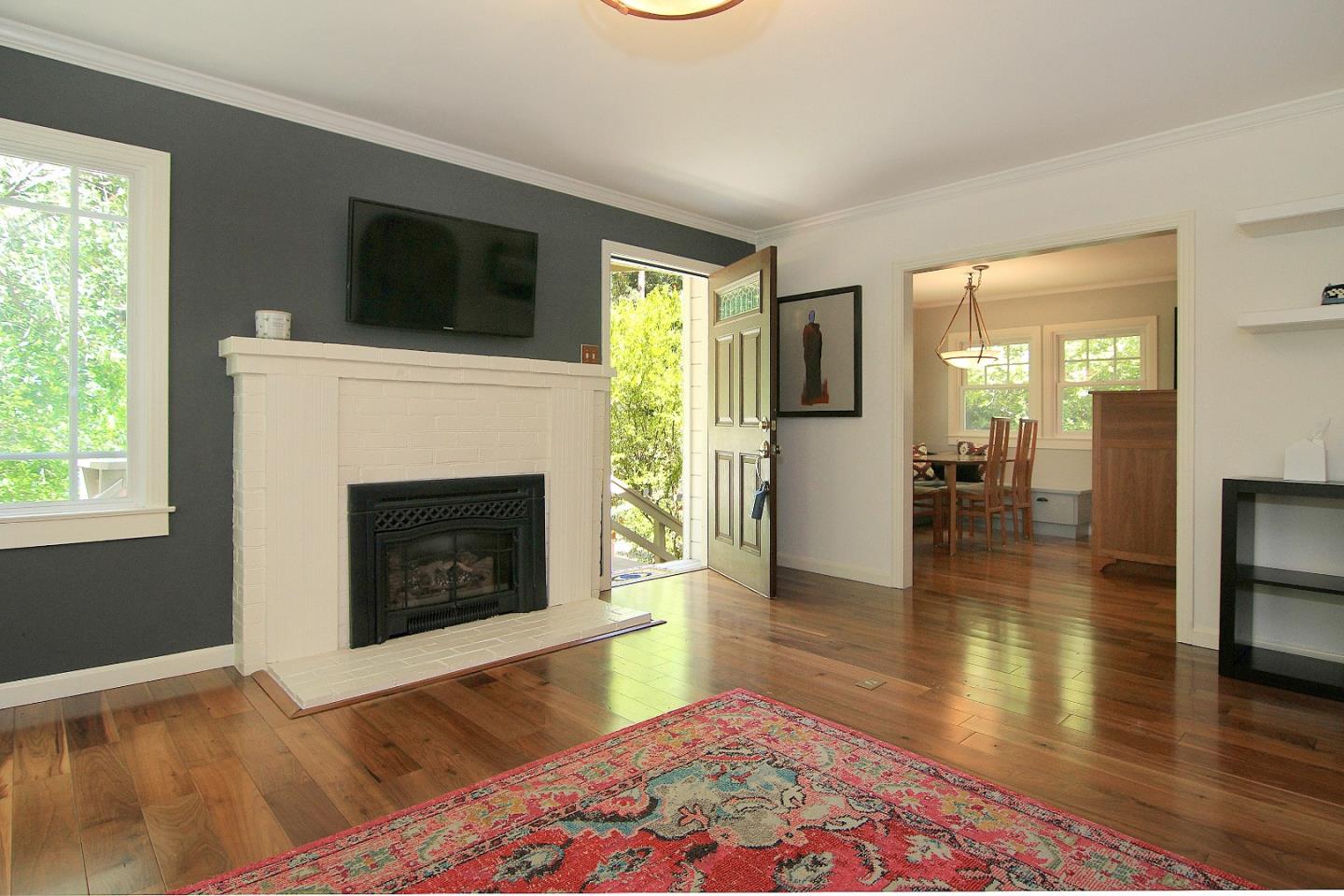 10990 Riverside Road Brookdale, CA 95005 - Photo 3 of 29 a living room with furniture and a fireplace