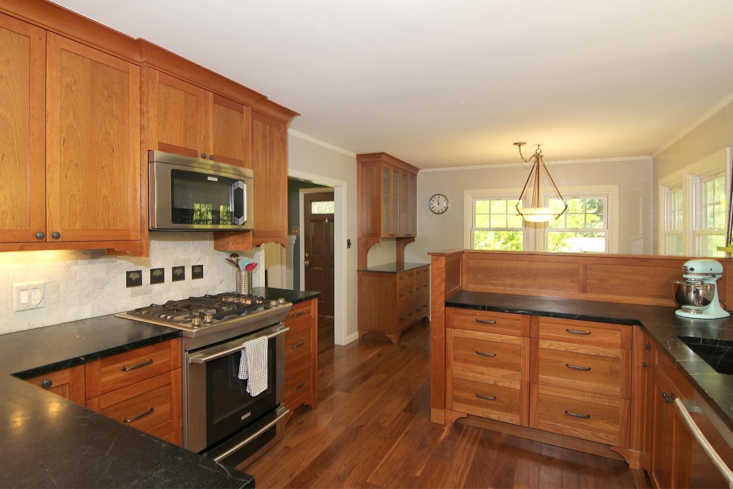 10990 Riverside Road Brookdale, CA 95005 - Photo 5 of 29 a kitchen with a stove a sink and a microwave