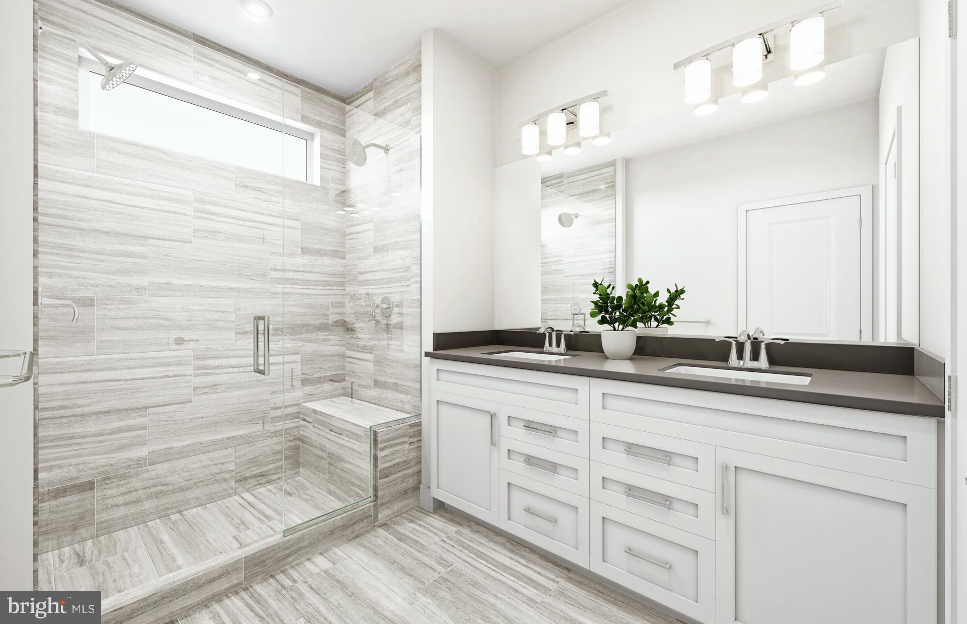 19868 Lavender Dust Square Ashburn, VA 20147 - Photo 7 of 22 a bathroom with a granite countertop sink a mirror and a shower