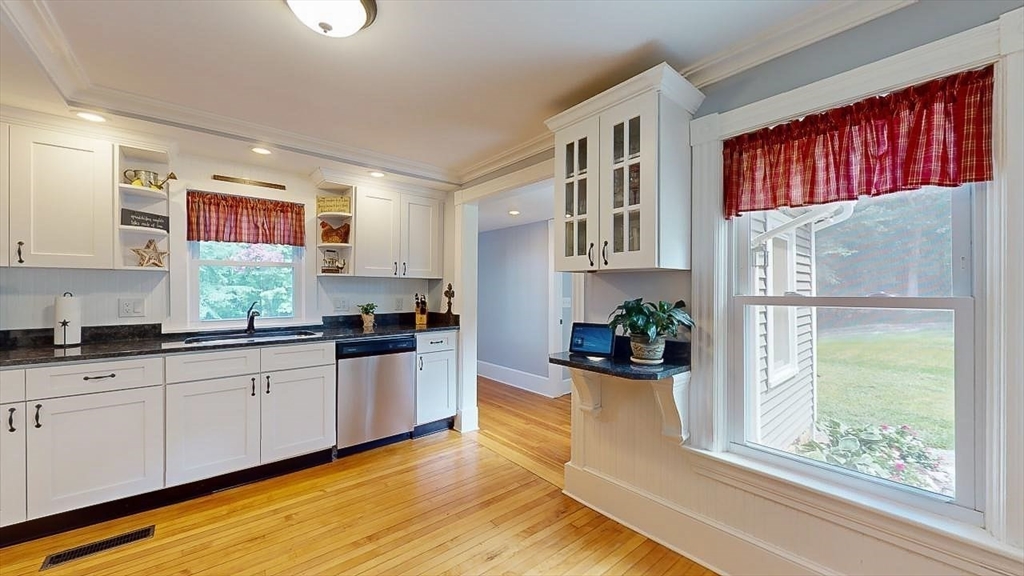509 Mendon Road Sutton, MA 01590 - Photo 16 of 42 a kitchen with stainless steel appliances granite countertop a refrigerator and a sink