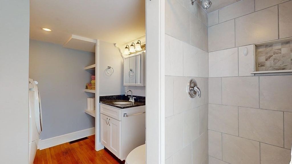 509 Mendon Road Sutton, MA 01590 - Photo 21 of 42 a room with cabinets and wooden floor