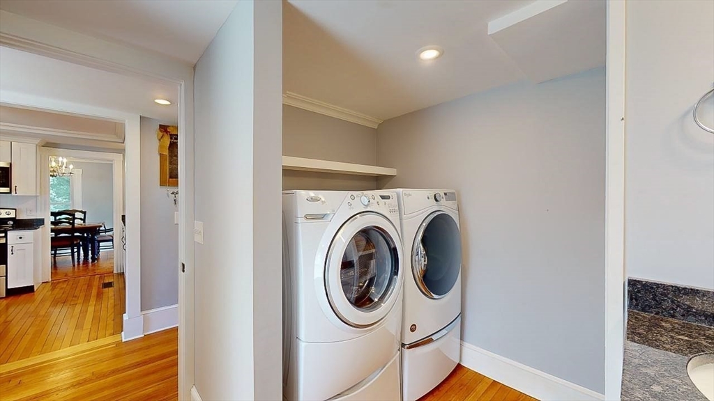 509 Mendon Road Sutton, MA 01590 - Photo 22 of 42 a utility room with dryer washer and a view of living area