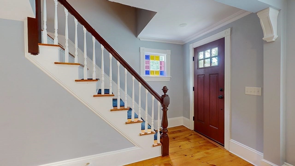 509 Mendon Road Sutton, MA 01590 - Photo 32 of 42 a view of entryway and hall with wooden floor
