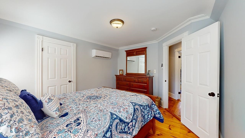 509 Mendon Road Sutton, MA 01590 - Photo 34 of 42 a bedroom with a bed and a closet