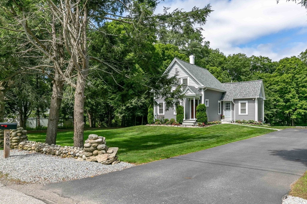 509 Mendon Road Sutton, MA 01590 - Photo 4 of 42 a view of a house with a yard and large tree