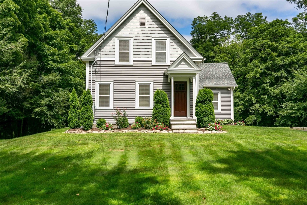 509 Mendon Road Sutton, MA 01590 - Photo 5 of 42 a view of a house with a yard