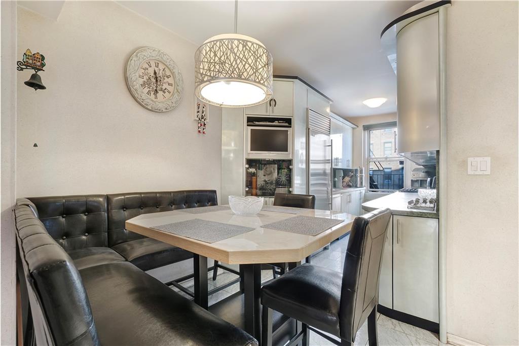 1900 Quentin Road, Unit C4 Brooklyn, NY 11229 - Photo 5 of 13 a view of a dining room with furniture
