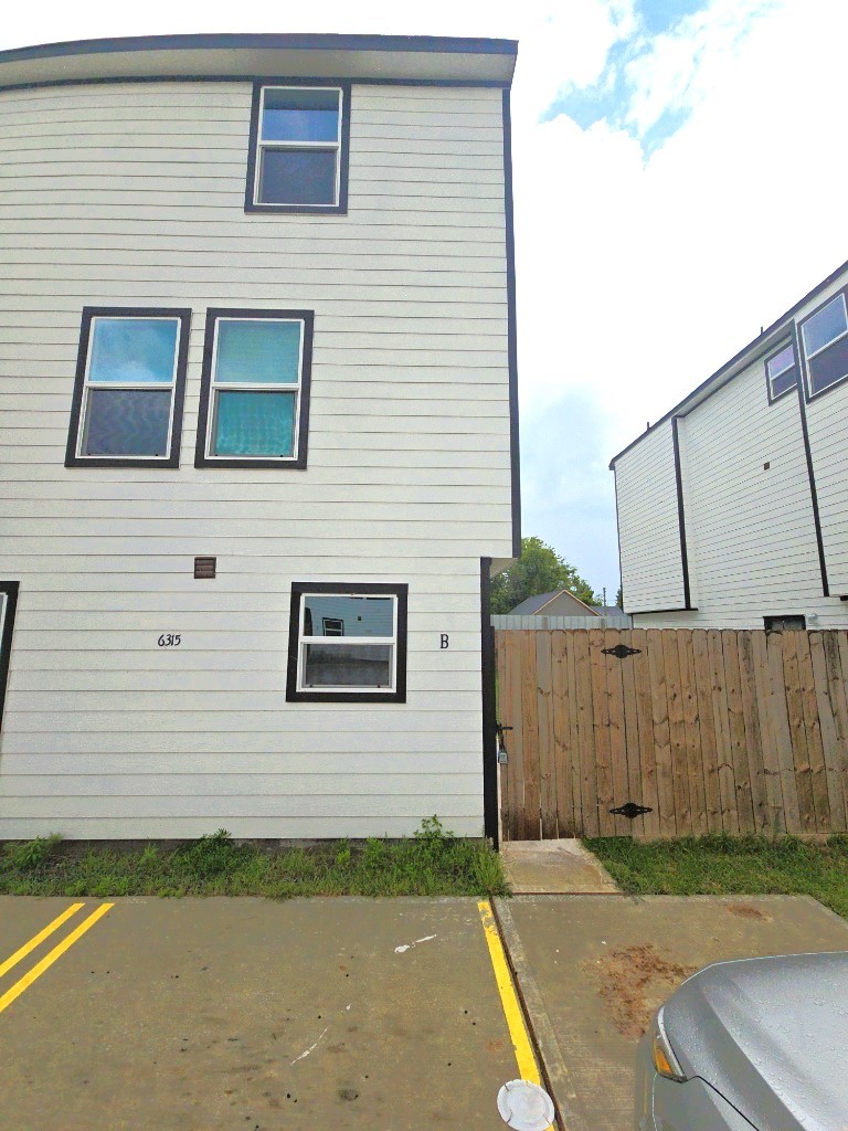 6315 Sandra Street, Unit A Houston, TX 77028 - Photo 19 of 21 a view of a house with a backyard
