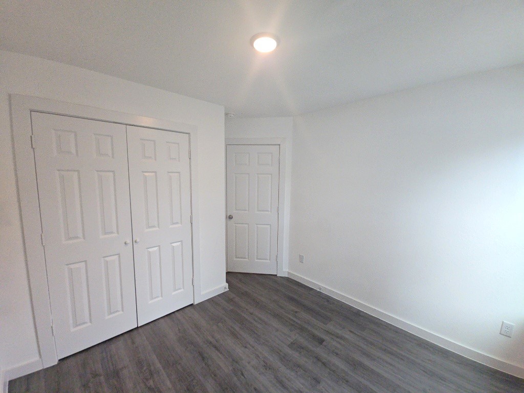6315 Sandra Street, Unit A Houston, TX 77028 - Photo 9 of 21 a view of an empty room and wooden floor