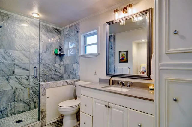 a bathroom with a small shower