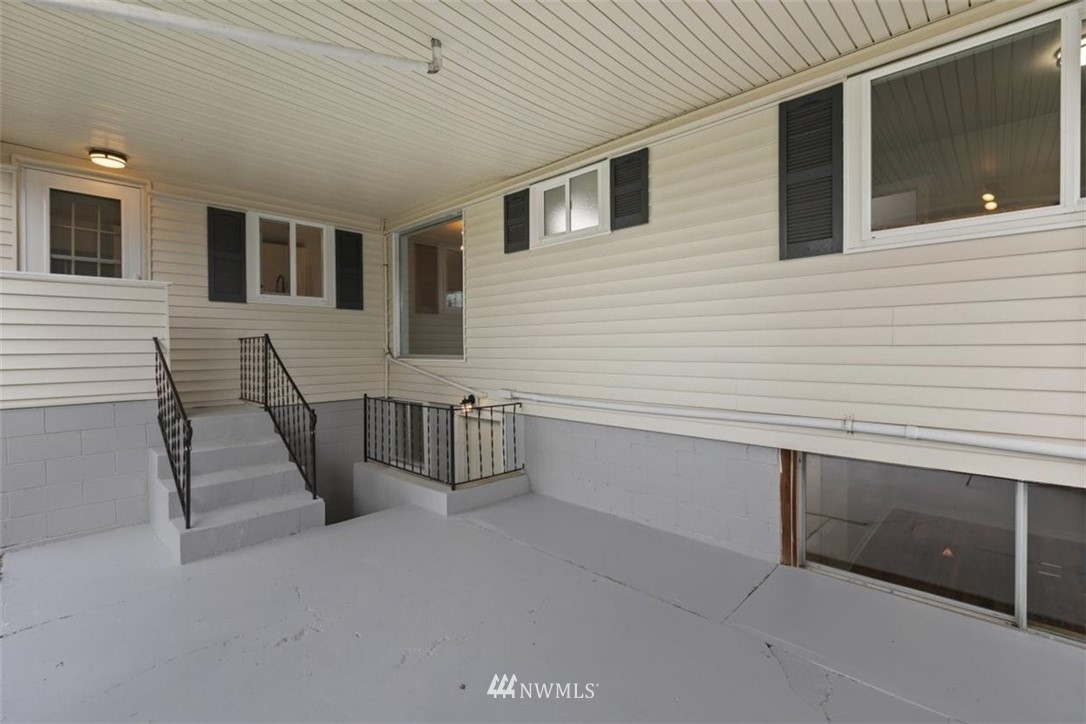 2613 Northeast 6th Place Renton, WA 98056 - Photo 22 of 27 a view of a house with a roof deck