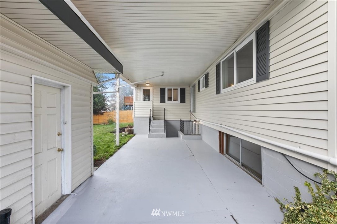 2613 Northeast 6th Place Renton, WA 98056 - Photo 23 of 27 a view of a house with a backyard