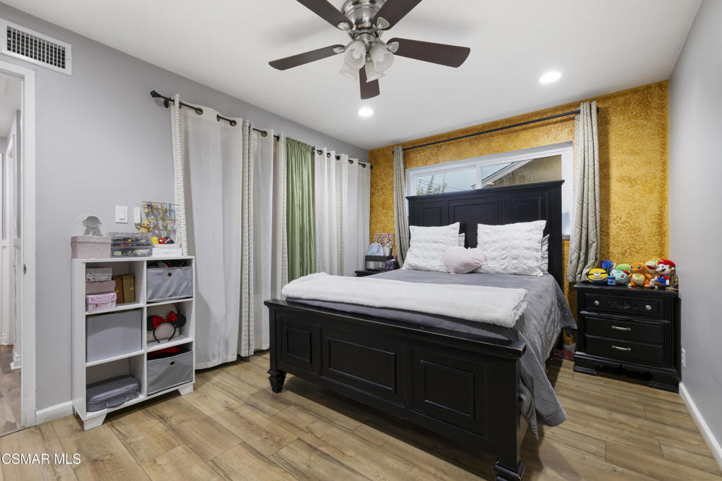 1231 Bluebell Street Oxnard, CA 93036 - Photo 18 of 44 a bedroom with a bed and a window