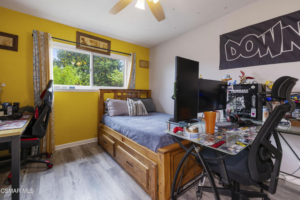 1231 Bluebell Street Oxnard, CA 93036 - Photo 28 of 44 a view of a workspace with furniture and a window
