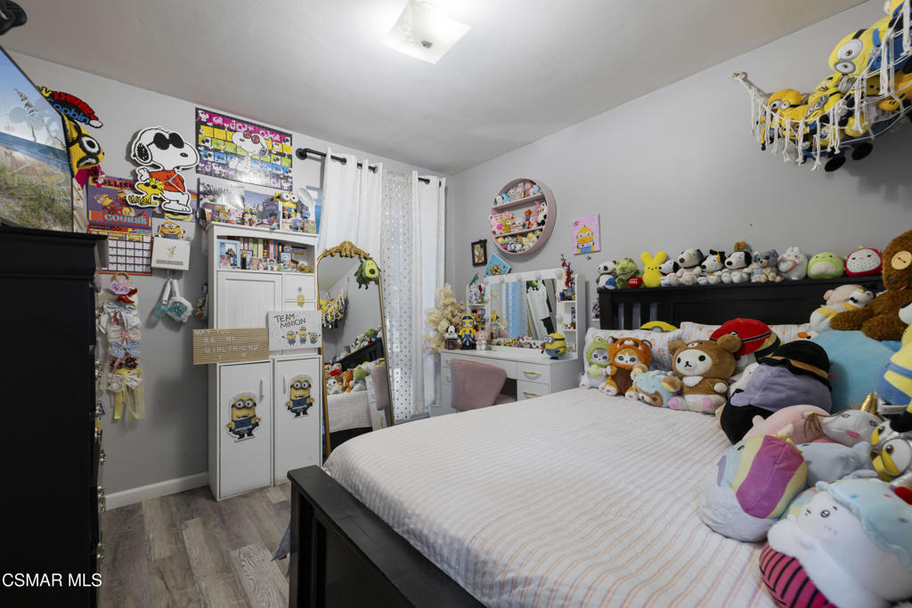 1231 Bluebell Street Oxnard, CA 93036 - Photo 29 of 44 a bed room with a bed and a bed