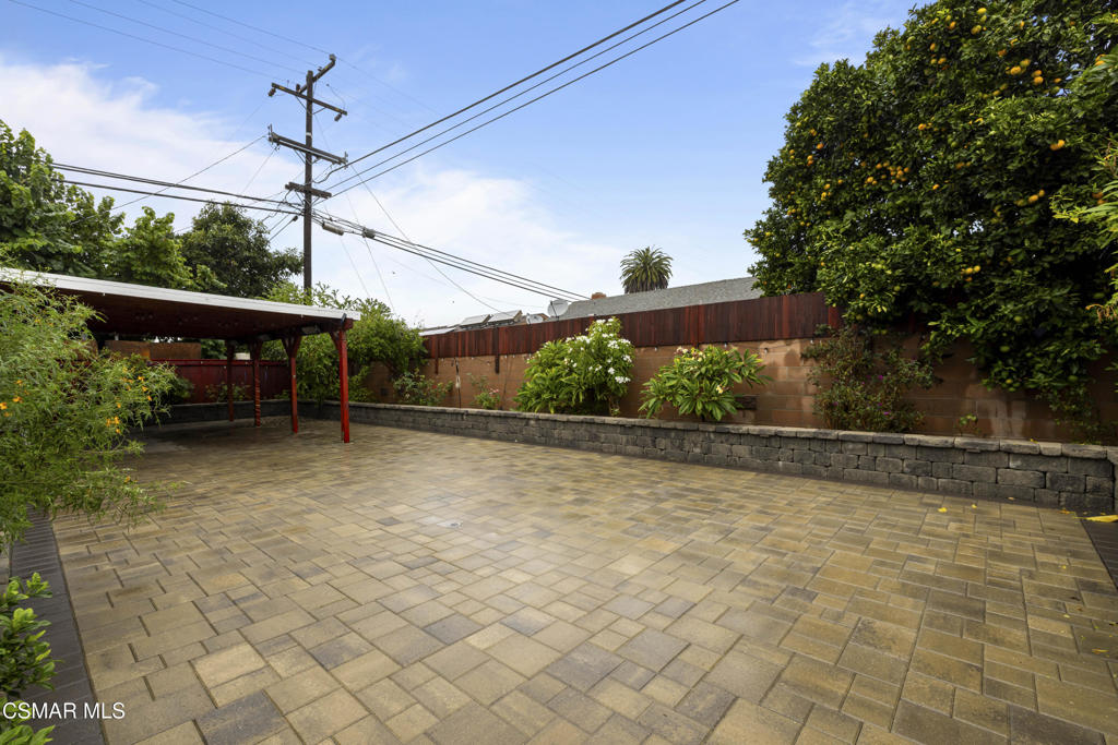 1231 Bluebell Street Oxnard, CA 93036 - Photo 33 of 44 a view of a terrace with a bench
