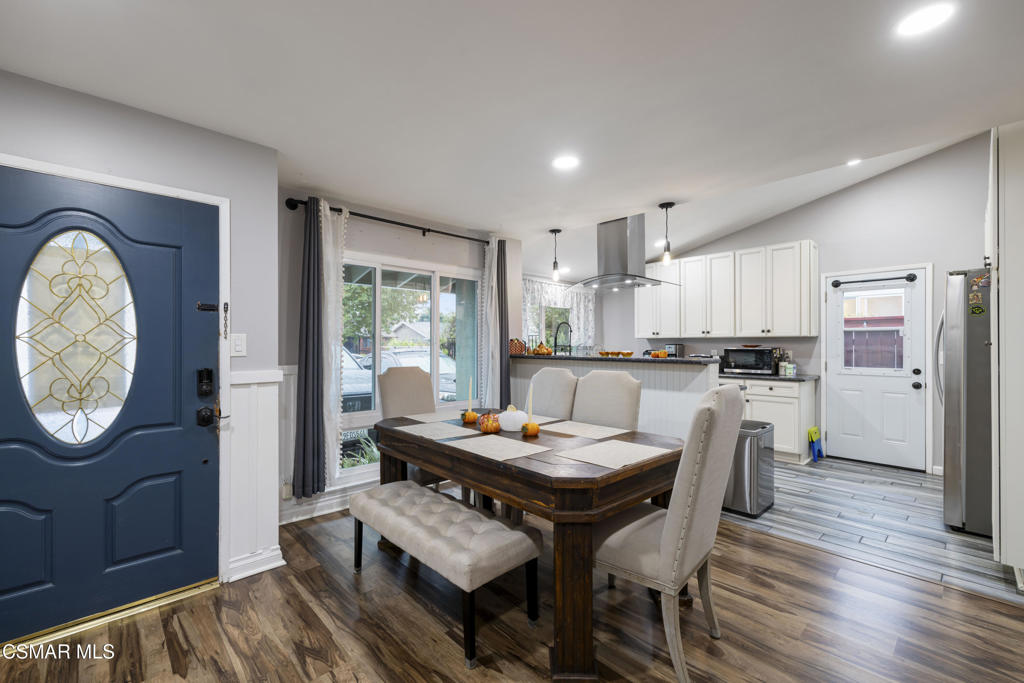 1231 Bluebell Street Oxnard, CA 93036 - Photo 5 of 44 a view of a dining room with furniture window and wooden floor