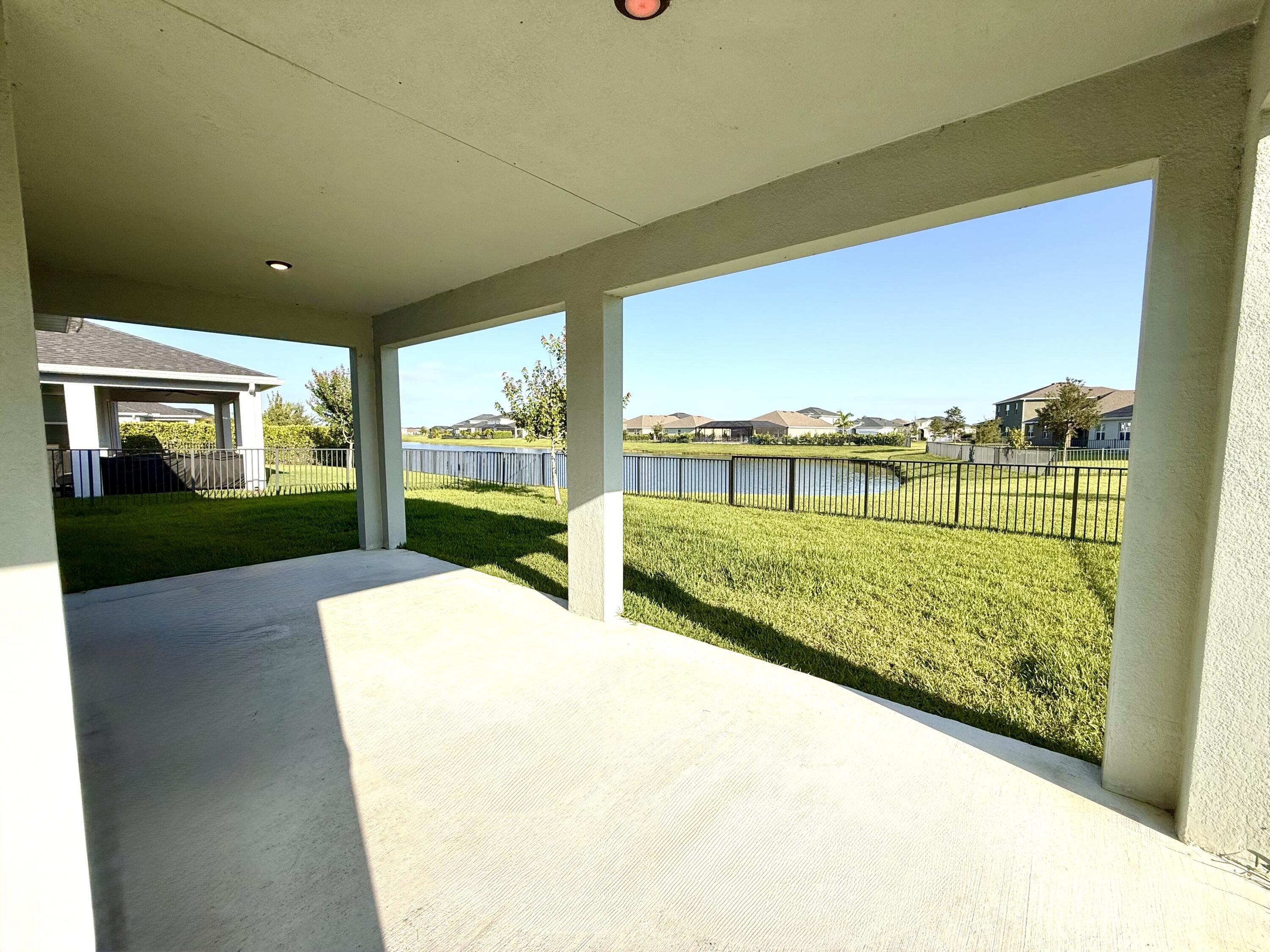 10819 Southwest Pacini Way Port St. Lucie, FL 34987 - Photo 29 of 43 a view of swimming pool from a balcony