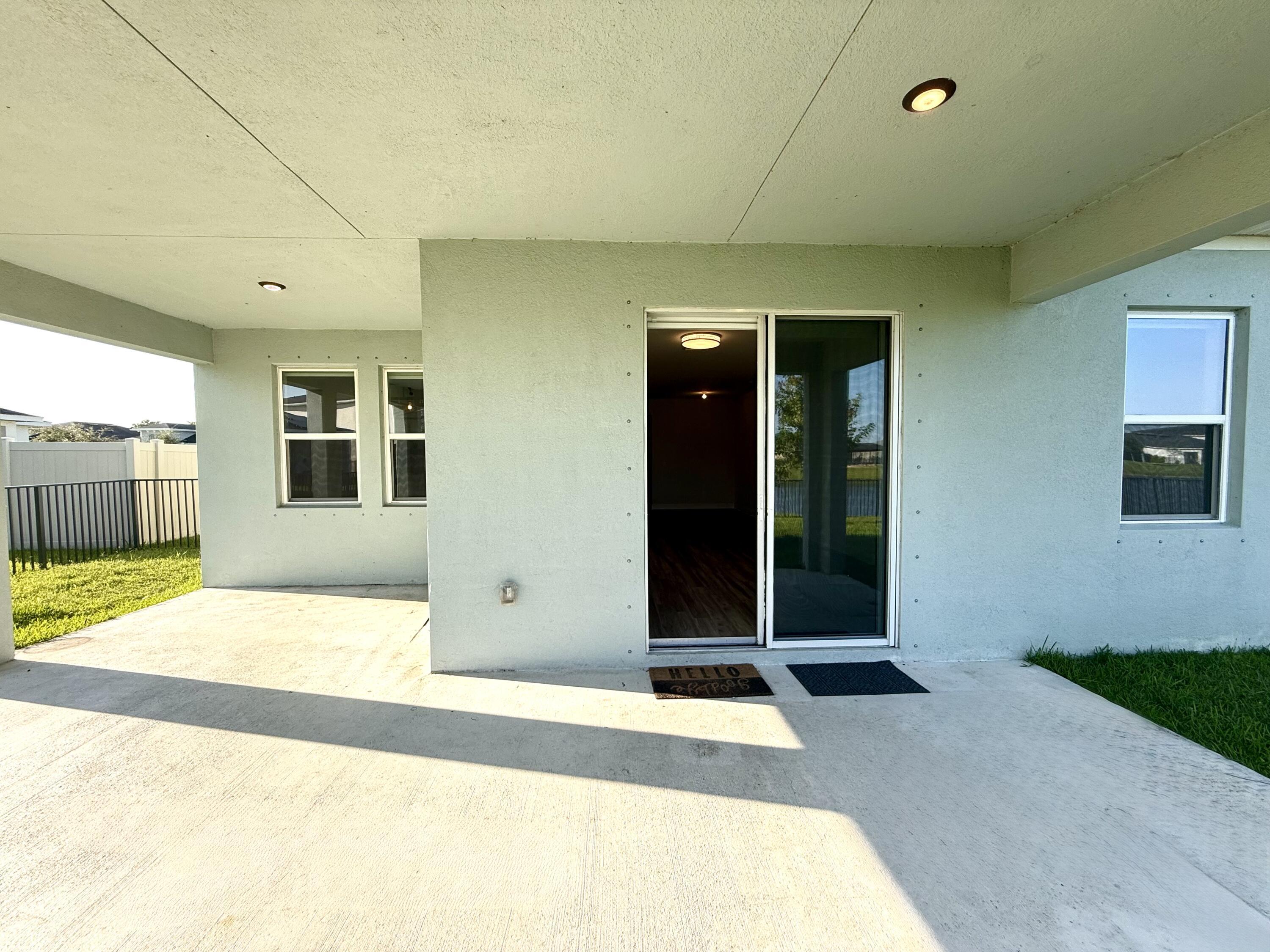 10819 Southwest Pacini Way Port St. Lucie, FL 34987 - Photo 32 of 43 a view of entrance of the building
