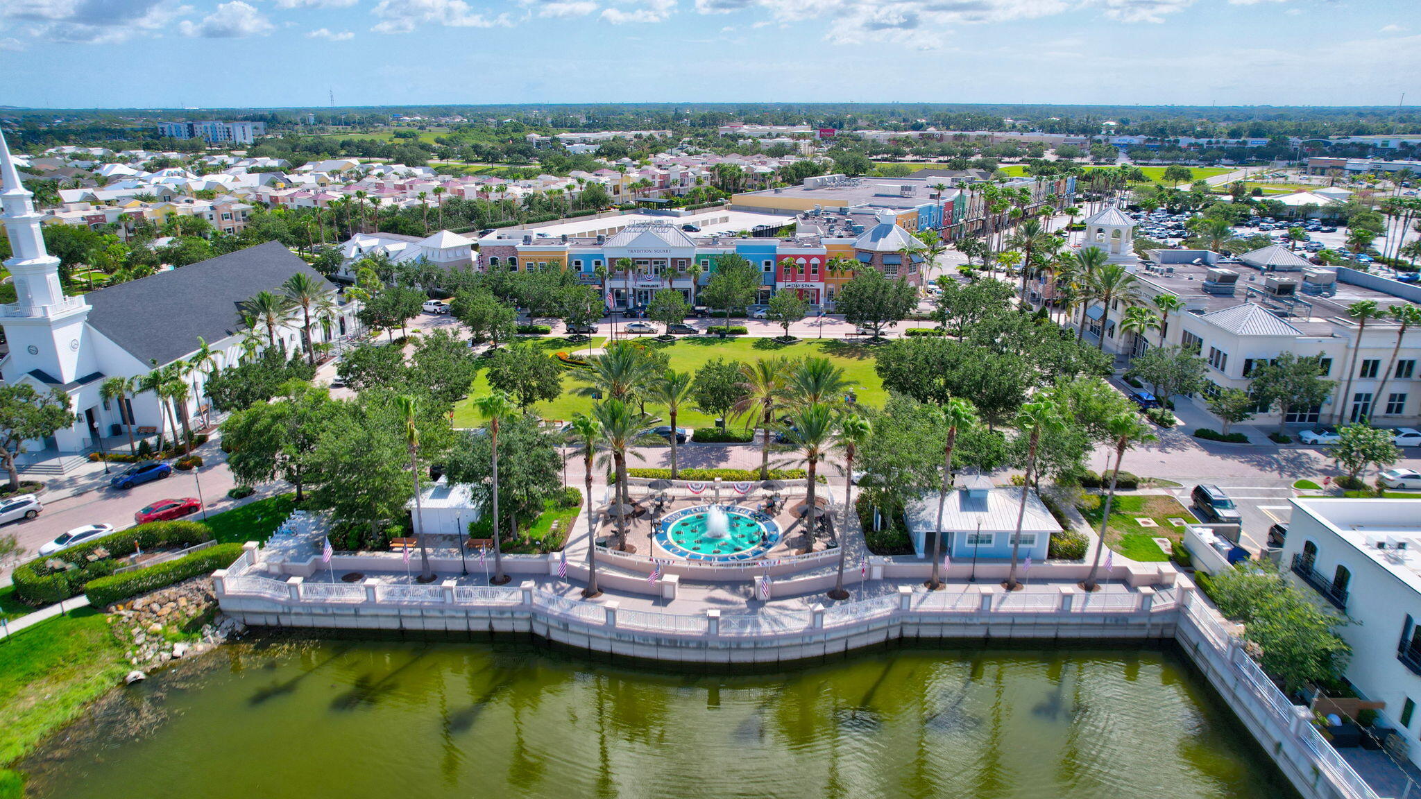 10819 Southwest Pacini Way Port St. Lucie, FL 34987 - Photo 40 of 43 a view of a city with tall buildings
