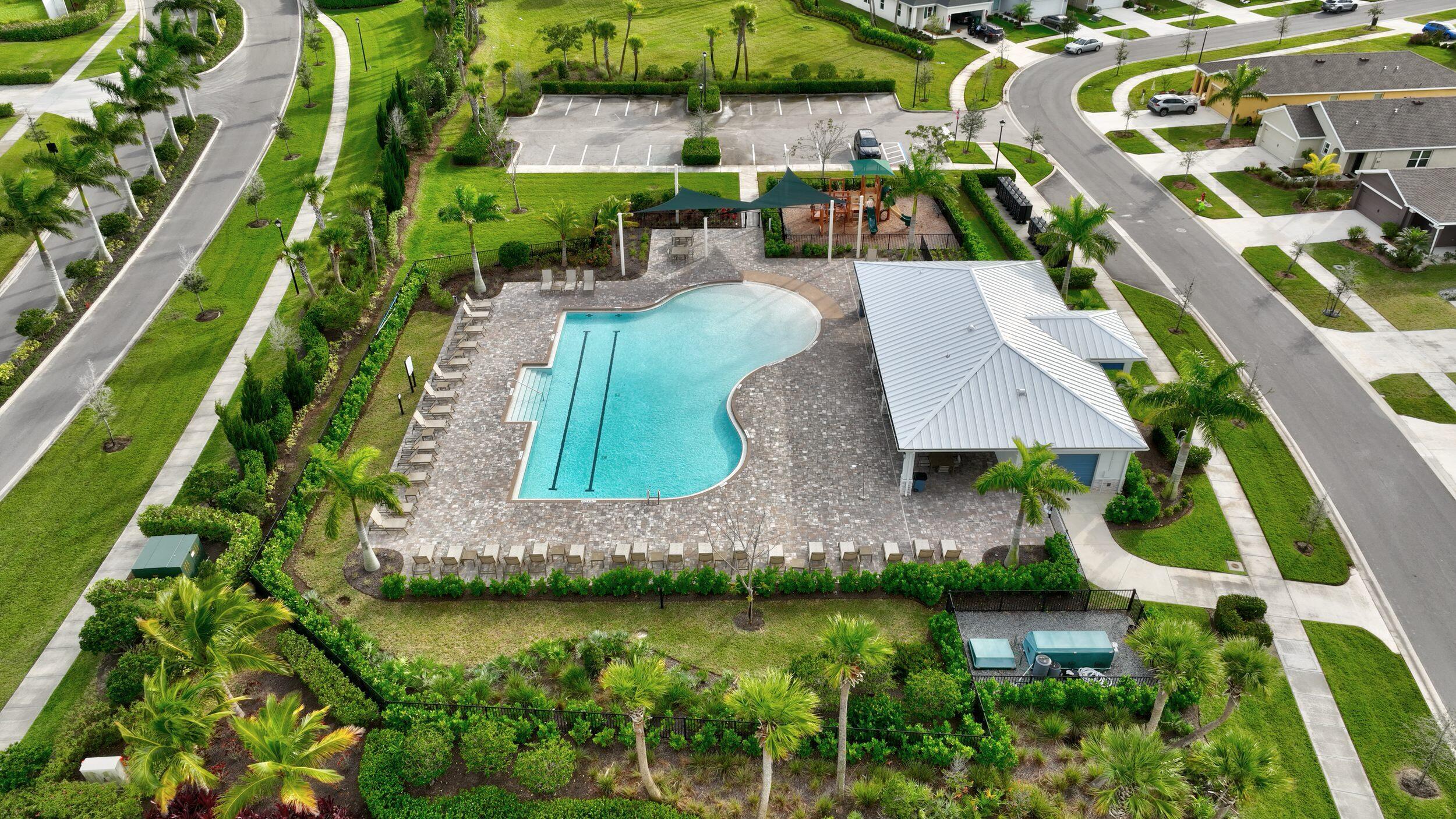 10819 Southwest Pacini Way Port St. Lucie, FL 34987 - Photo 7 of 43 an aerial view of house with yard swimming pool and outdoor seating