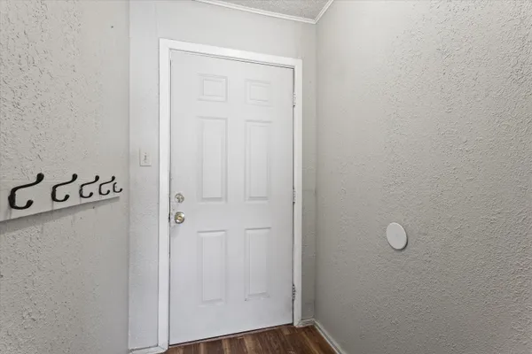 a view of a room with rack on the wall