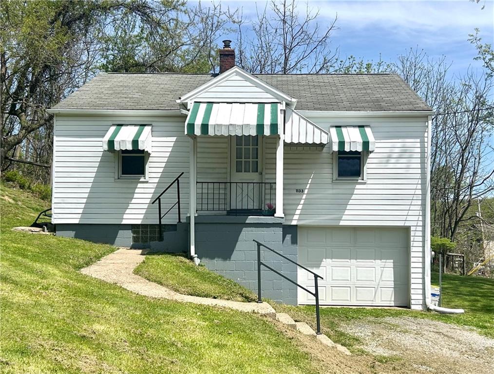 1133 Venetia Road Eighty Four, PA 15330 - Photo 1 of 26 a front view of a house with a yard